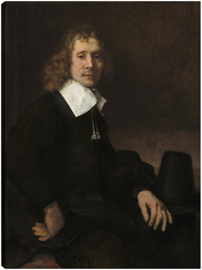 Un joven sentado en una mesa (posiblemente Govaert Flinck) (c. 1660) - Rembrandt Van Rijn