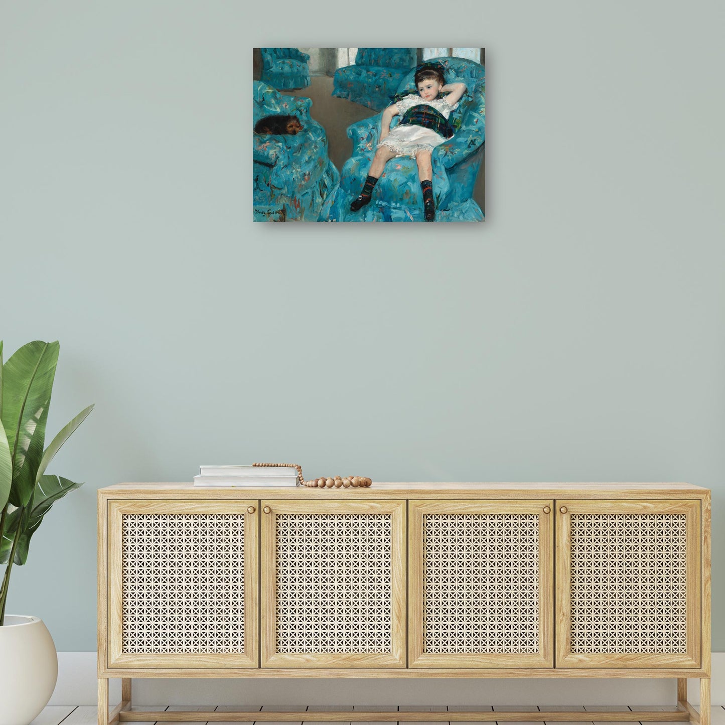 Niña en un sillón azul - Mary Cassatt